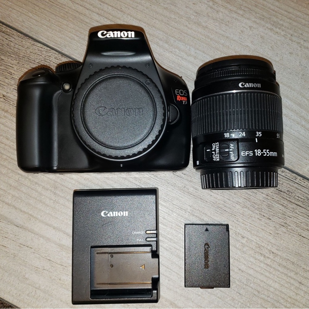 Canon Black DSLR Camera with Zoom Lens and Carry Case